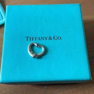 Authentic Tiffany and Co. pink sapphire open heart pendant